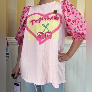 Pink Shirt with Cherry Design